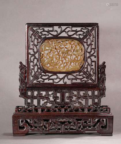 A MING DYNASTY RED SANDALWOOD INLAID HETIAN WHITE JADE TABLE...