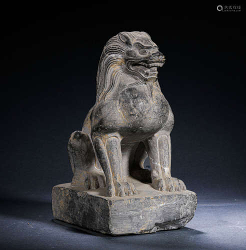 A STONE GURADIAN LION STATUE