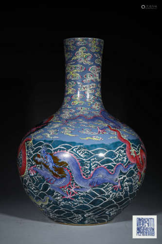 A LARGE SKY BALL PORCELAIN VASE; OCEAN AND DRAGON DESIGN