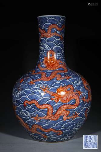 A LARGE PORCELAIN VASE; OCEAN AND DRAGON DESIGN