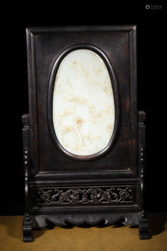 A QING DYNASTY RED SANDALWOOD INLAID HETIAN WHITE JADE TABLE...