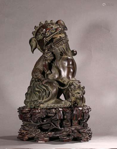 A MING DYNASTY BRONZE LIONS