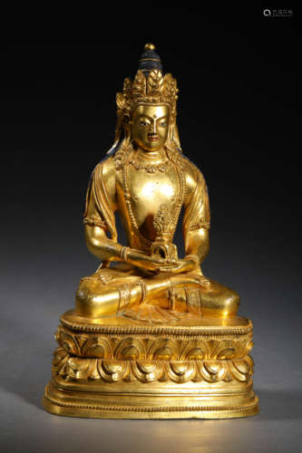 A GILDED BRONZE BUDDHA STATUE; MING DYNASTY