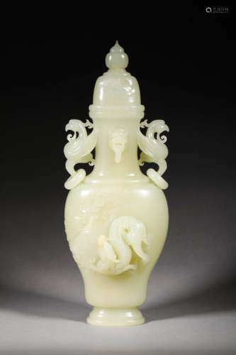 A DECORATIVE HETIAN WHITE JADE VASE,A DECORATIVE HETIAN WHIT...