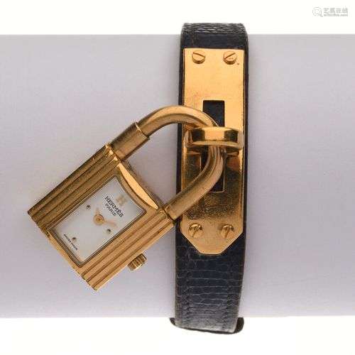 HERMES - Kelly. Montre de dame. Boitier plaqué or, dimension...