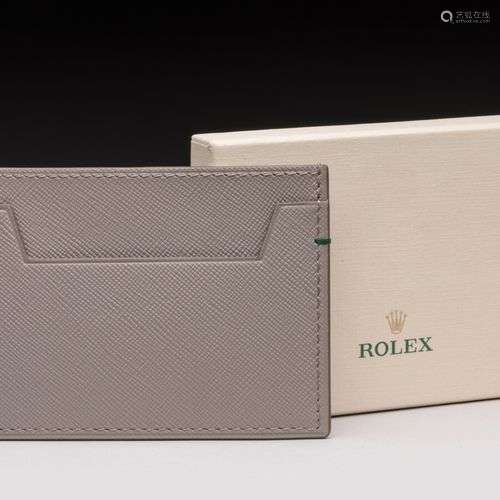 ROLEX - PORTE CARTES en cuir grainé gris perle. 7.5 x 10 cm....