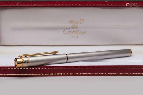 MUST de CARTIER - STYLO PLUME modèle Santos en acier et plum...