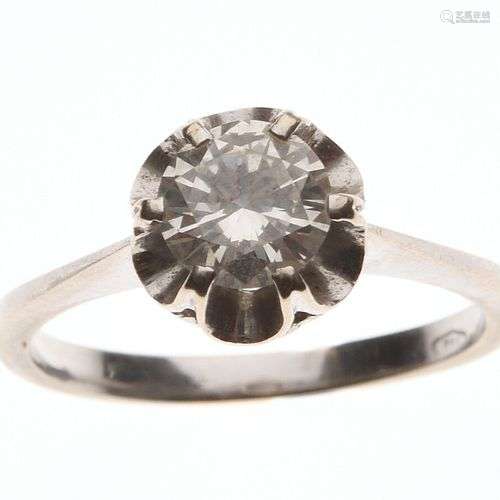 BAGUE solitaire en or gris 750/°°ornée d'un diamant taillé e...