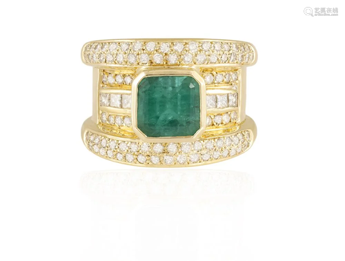 AN EMERALD AND DIAMOND RING The central cut-cornered