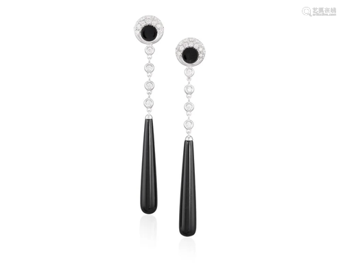 A PAIR OF ONYX AND DIAMOND PENDENT EARRINGS, BY