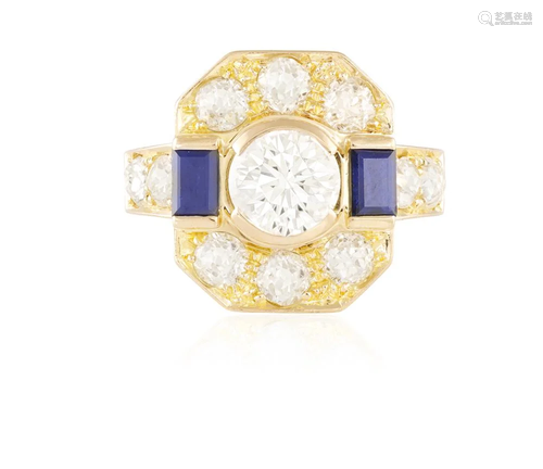 A DIAMOND AND SAPPHIRE RING The central brilliant-cut