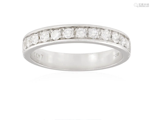 A DIAMOND HALF-ETERNITY RING The frontispiece composed