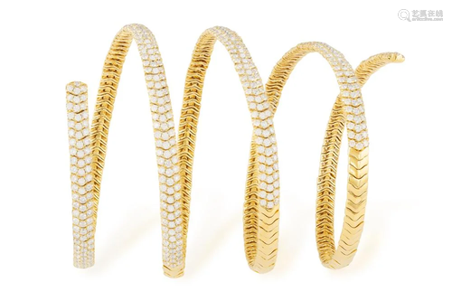 A DIAMOND BRACELET The coiled gold spring bracelet