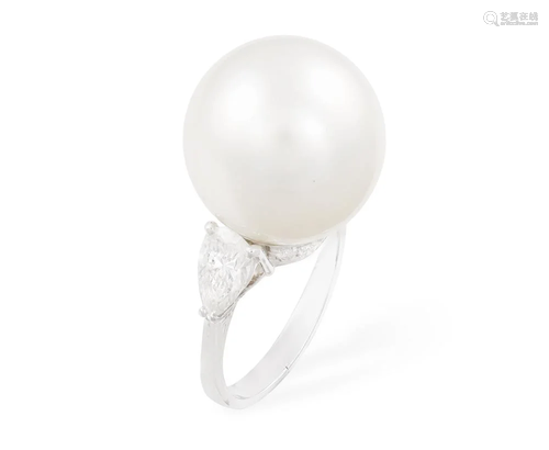 A CULTURED PEARL AND DIAMOND DRESS RING The central