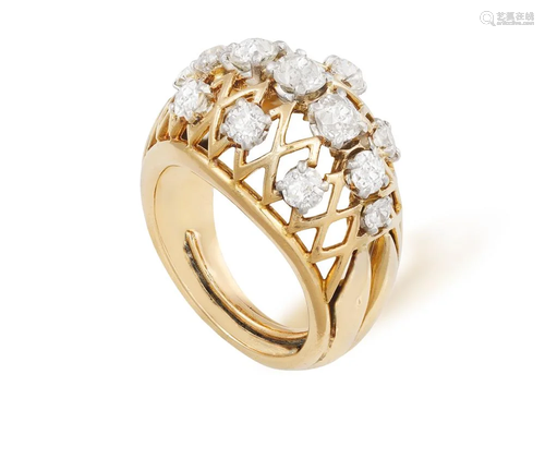 A RETRO DIAMOND RING, CIRCA 1950 Of domed openwork