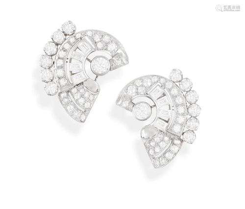 A PAIR OF DIAMOND EARCLIPS, CIRCA 1950 Of scrolling