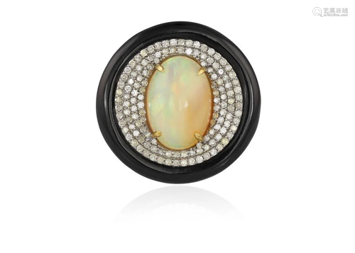 AN OPAL, ONYX AND DIAMOND COCKTAIL RING The central