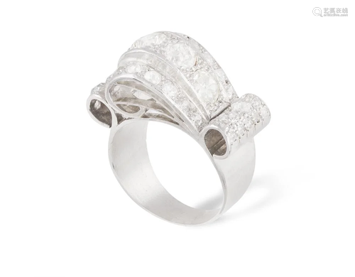 A DIAMOND DRESS RING, CIRCA 1945 Of odeonesque design,