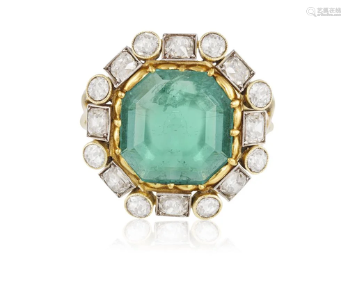 AN EMERALD AND DIAMOND DRESS RING, CIRCA 1955 The