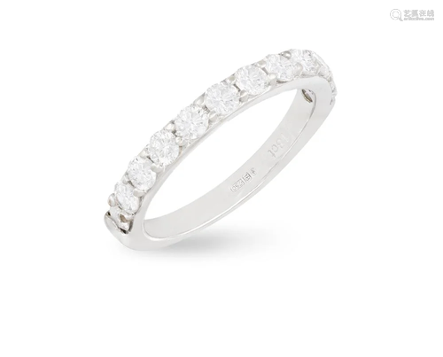 A DIAMOND HALF-ETERNITY RING The frontispiece set with