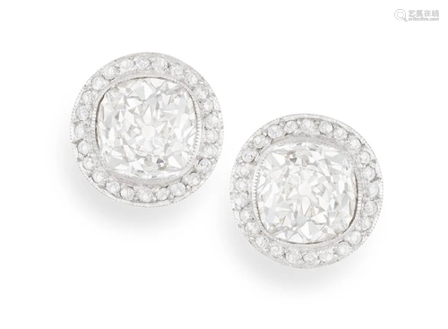 A PAIR OF DIAMOND EARSTUDS Each old cushion-shaped