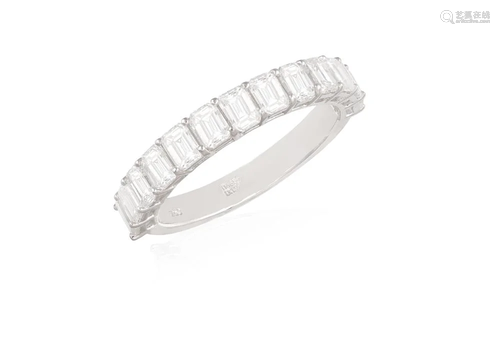 A DIAMOND HALF-ETERNITY RING The frontispiece set with