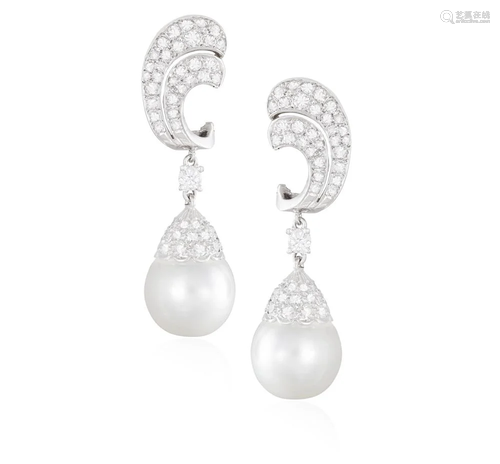 A PAIR OF CULTURED PEARL AND DIAMOND PENDENT EARRINGS