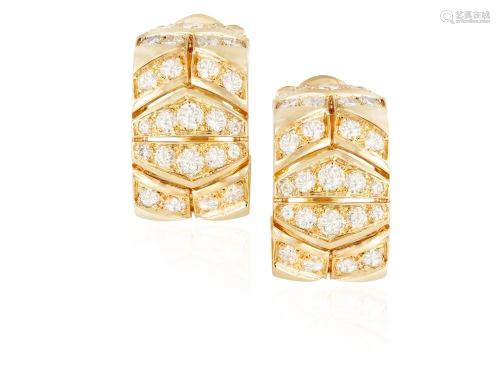 A PAIR OF DIAMOND EARCLIPS, BY CARTIER Each thick