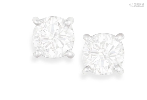 A PAIR OF DIAMOND EARSTUDS Each brilliant-cut diamond