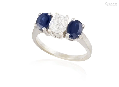 A SAPPHIRE AND DIAMOND THREE-STONE RING The central old