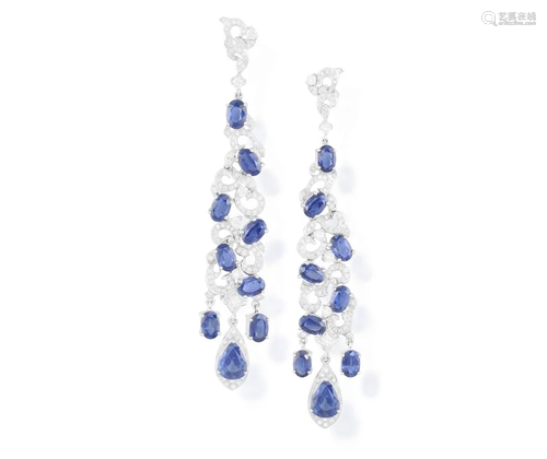 A PAIR OF SAPPHIRE AND DIAMOND PENDENT EARRINGS Of