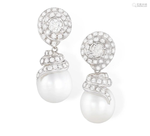 A PAIR OF CULTURED PEARL AND DIAMOND PENDENT EARRINGS