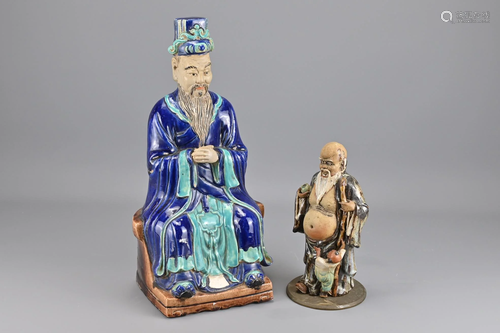 A Chinese Blue Glazed Seated Figure of A Scholar