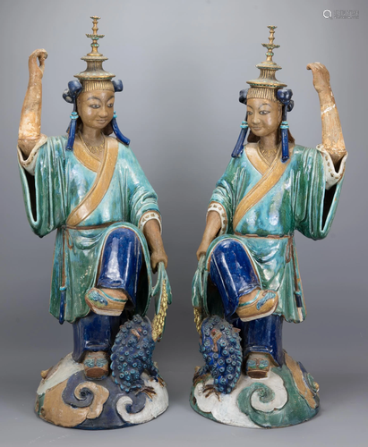 A Large Pair of Chinese Green Glazed Pottery Danci