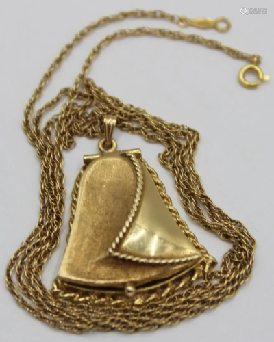 JEWELRY. 14kt Yellow Gold Bell Locket and Chain.