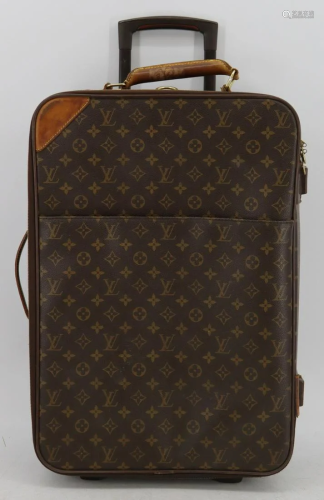 COUTURE. Louis Vuitton Rolling Suitcase Luggage.