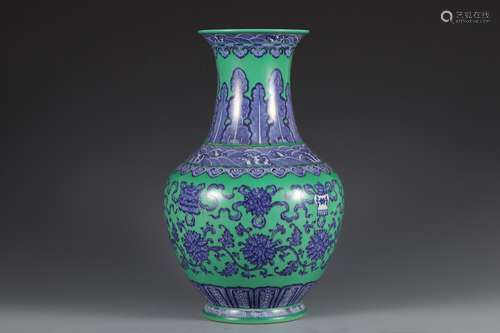 Qing Dynasty blue and white green glaze lotus vase with tang...