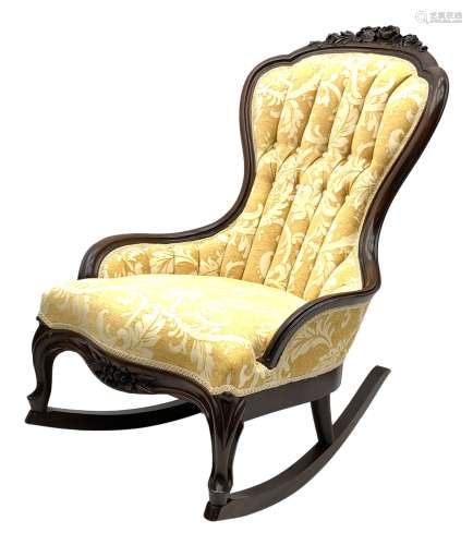 Early 20th century rocking chair with raised floral and foli...