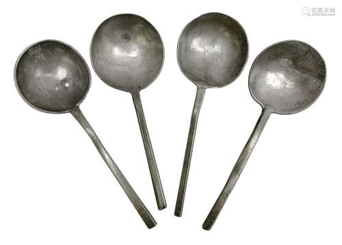 Four 17th century pewter/latten slip top spoons with round b...