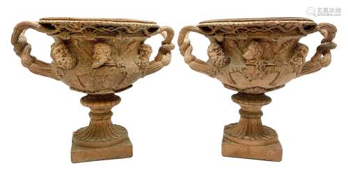 Pair of late 19th/early 20th century terracotta twin handled...