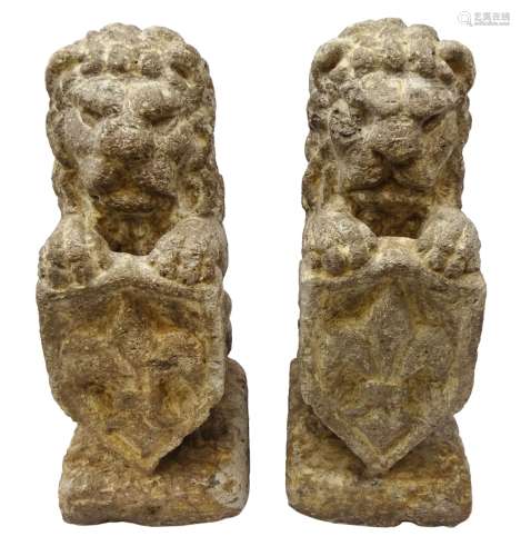 Pair 20th century composition stone heraldic lions