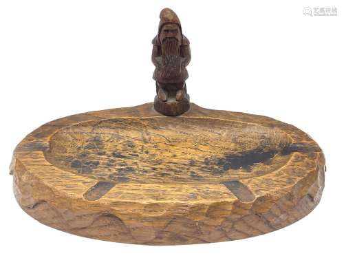 'Gnomeman' tooled oak ashtray of elongated oval form