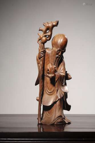 CARVED WOOD IMMORTAL STATUE