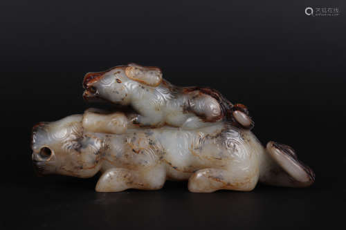 A BROWNISH JADE FIGURE ANIMAL