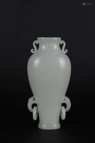 A CARVED JADE LOOP-HANDLE VASE