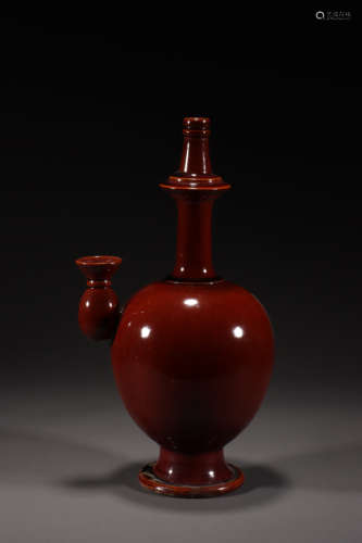 A SACRIFICIAL RED GLAZE BUDDHIST VASE