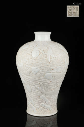 White porcelain embossed plum vase with fish pattern