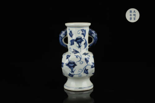 blue and white flower elephant ear vase