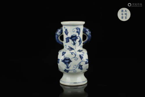 blue and white flower elephant ear vase