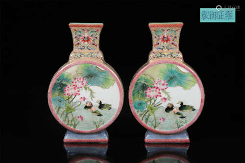 A pair of enamel colored lotus flower and bird flat bottlesA...